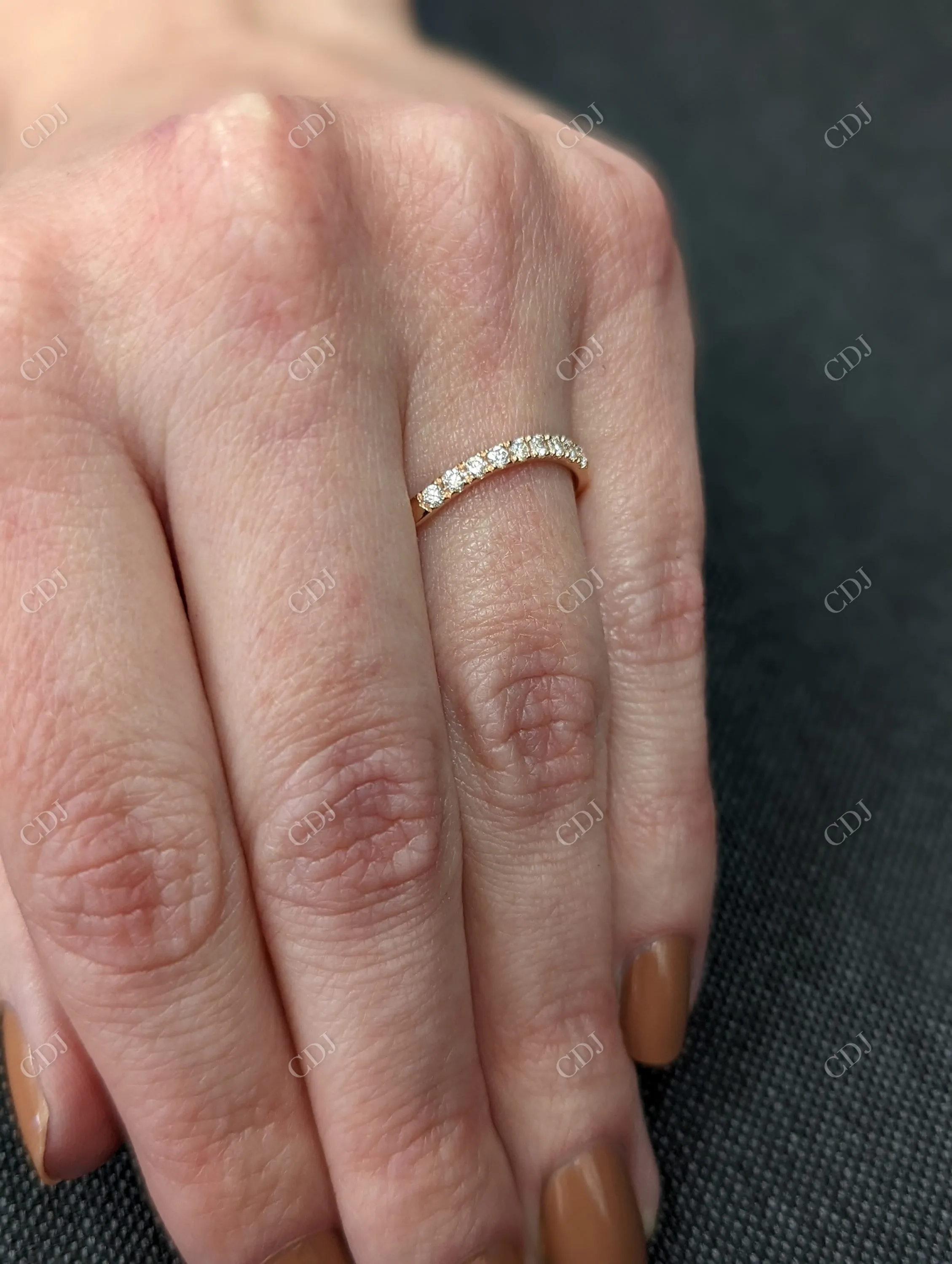 0.08CTW Curved Diamond Half Eternity Wedding Band