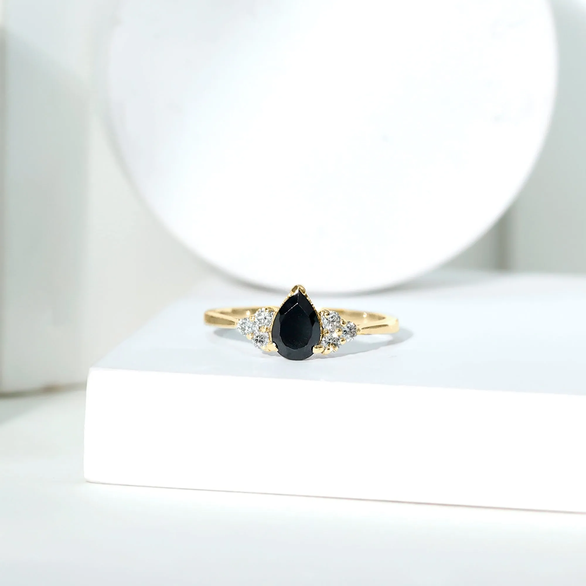 1 CT Pear Shaped Black Onyx Solitaire Ring with Diamond Trio