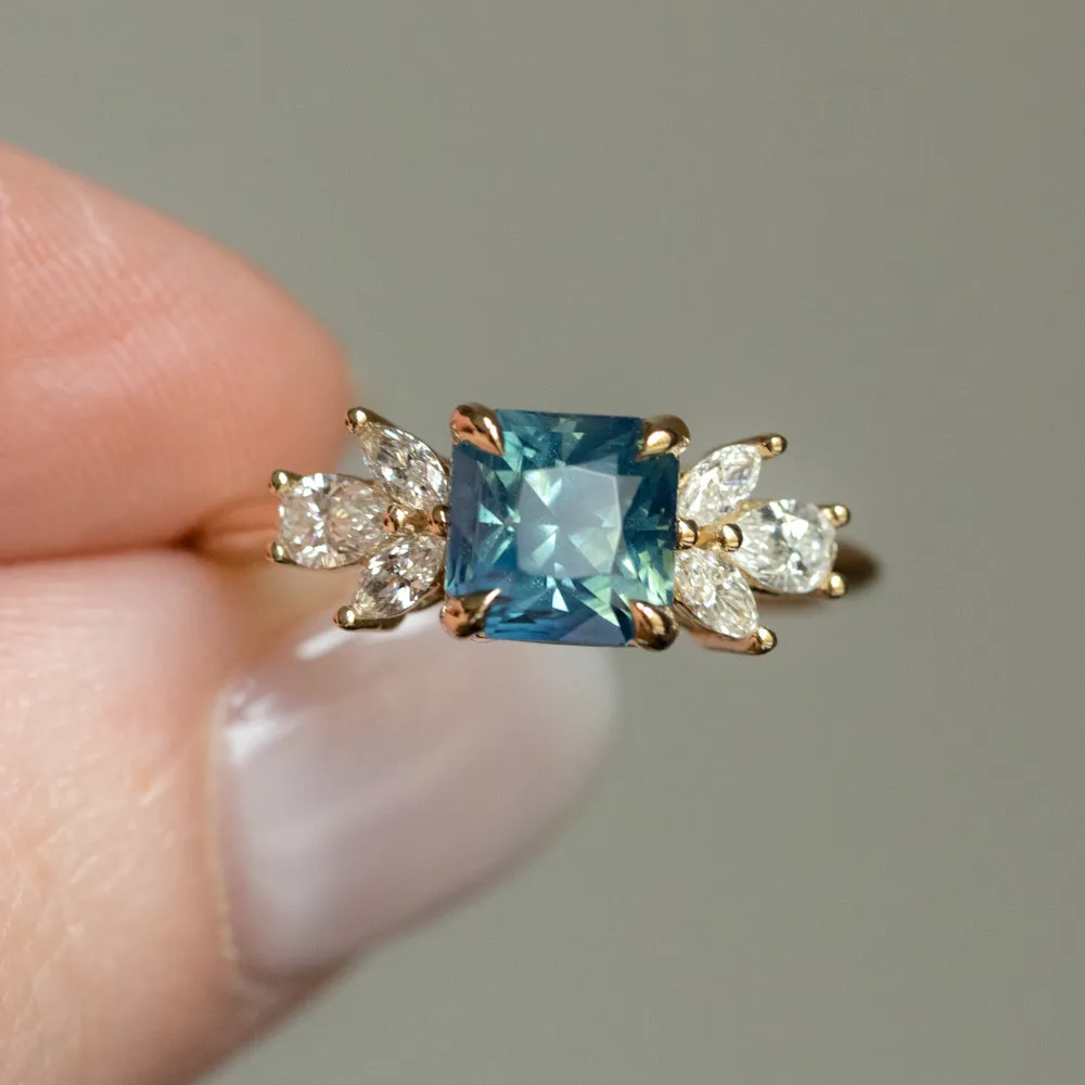 2.03ct Silky Medium Teal Radiant Cut Sapphire and Marquise Diamond Cluster Ring in 14k Yellow Gold