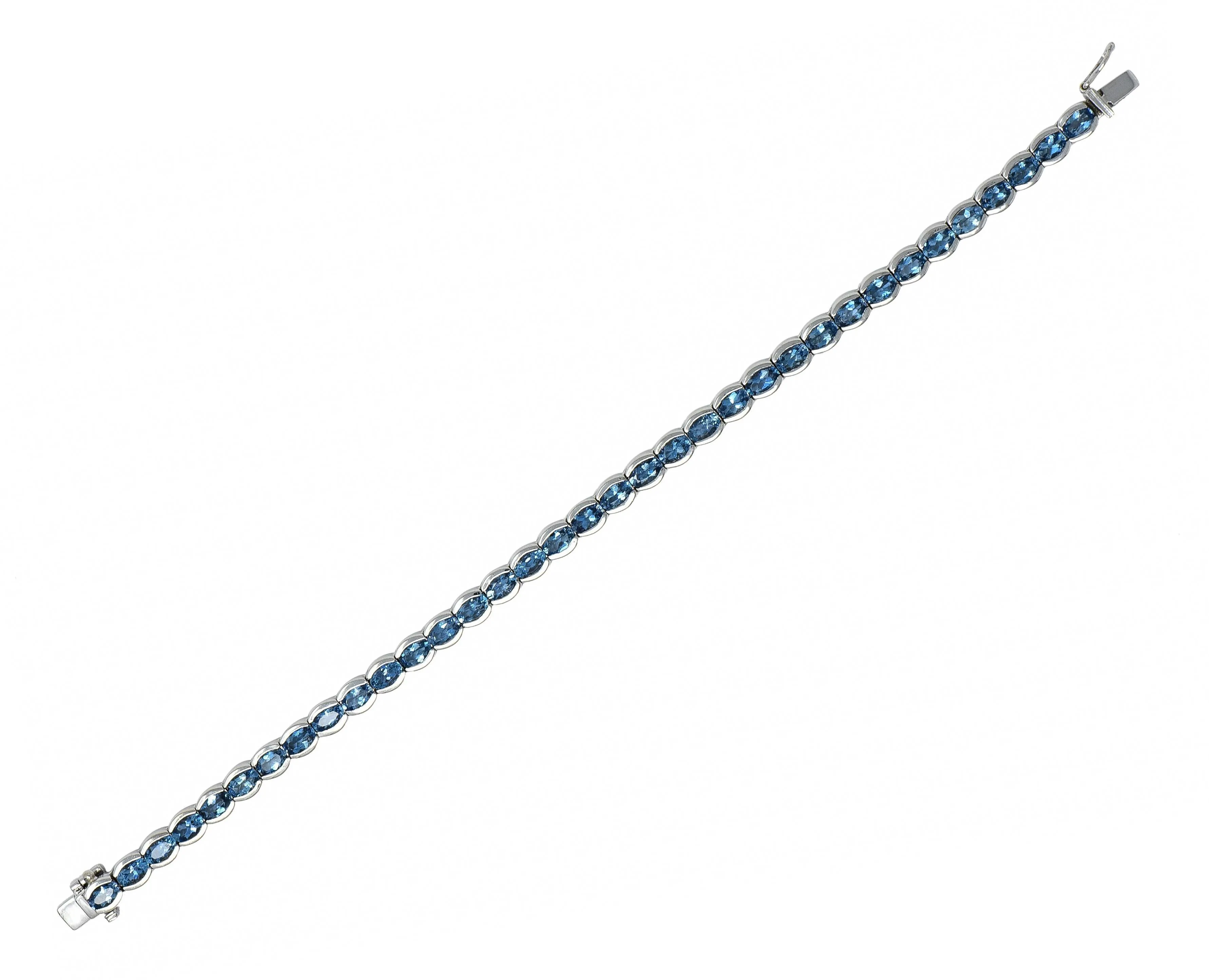 Contemporary 9.80 CTW Blue Topaz 14 Karat White Gold Line Bracelet