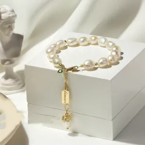 Cultured Pearls and Cross Charm Natural pearl bracelet with elegant charms for women