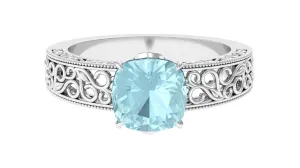 Cushion Cut Solitaire Sky Blue Topaz Filigree Ring in Claw Setting