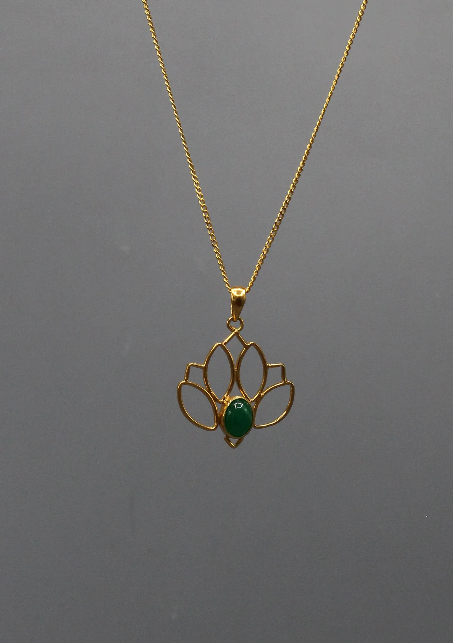 Elegant Emerald inlaid Gold Plated Lotus Pendant