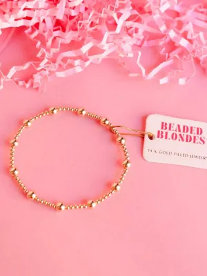 Extended Lively Gold Beaded Bracelet