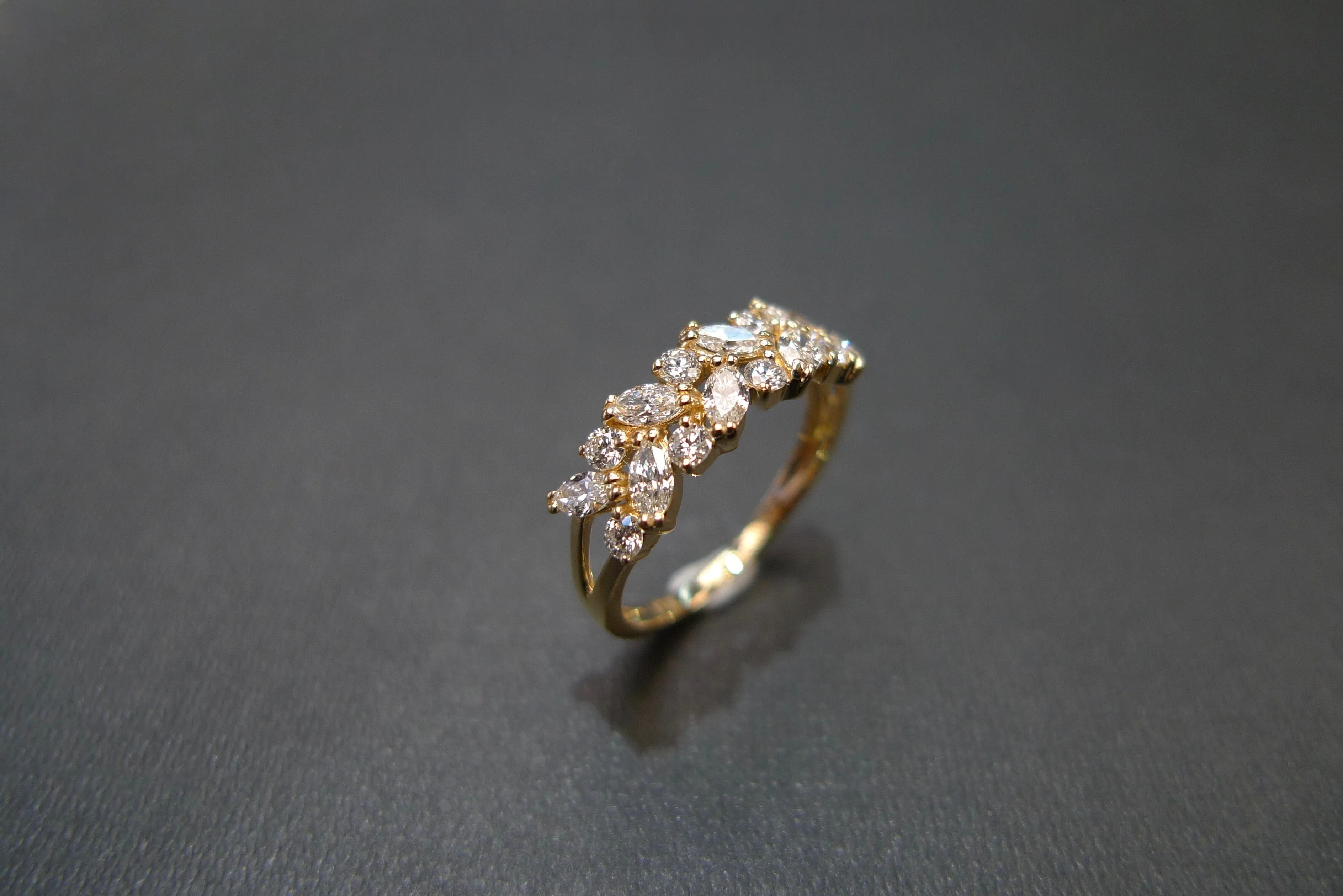 Marquise Cut Diamond and Round Brilliant Cut Diamond Ring in Yellow Gold