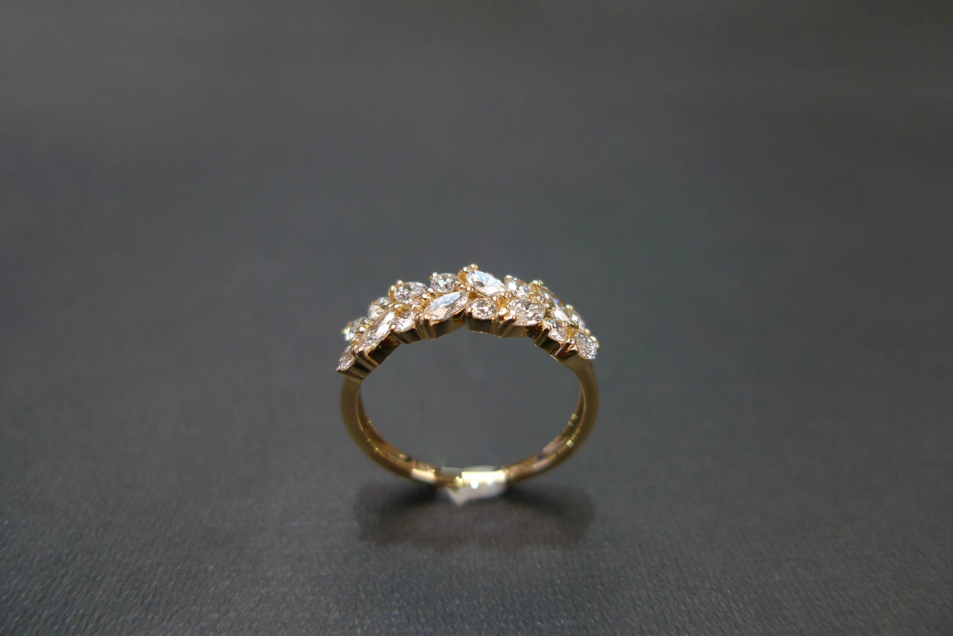 Marquise Cut Diamond and Round Brilliant Cut Diamond Ring in Yellow Gold