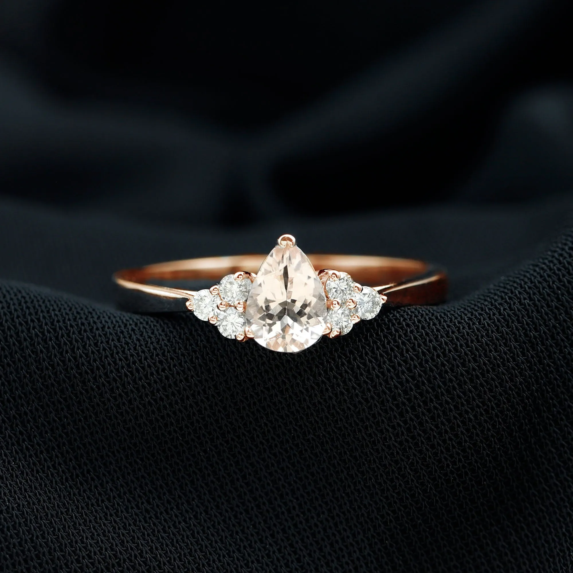 Pear Shaped Morganite Solitaire Ring with Diamond Trio